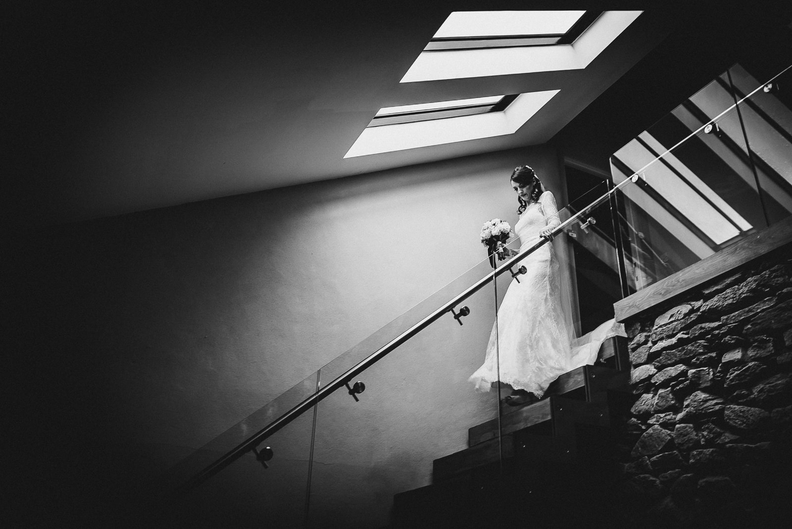 Bride descending stairs at Trevenna